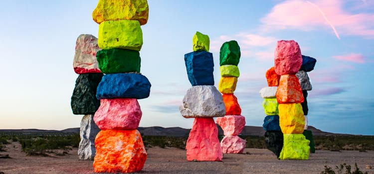 stacked rocks in multiple bright and vibrant colors