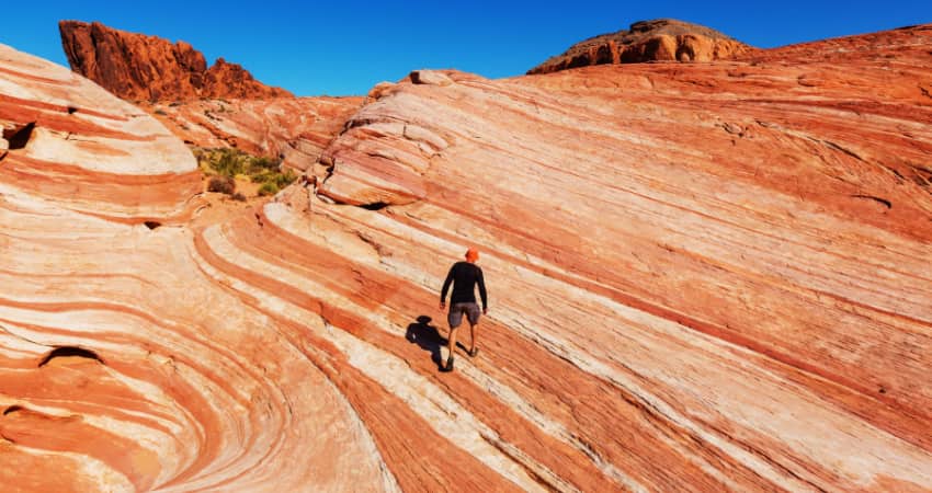 A hiker at Valley of Fire State Park